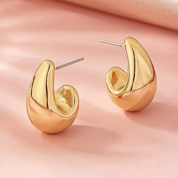 Boucle d'oreille dorée en...